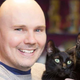 Billy Corgan, smiling politely.